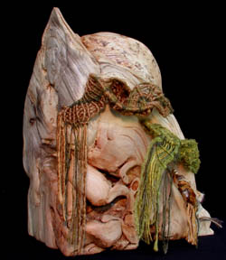 Wood sculpture of the Feminine as sacred space, Burden baskets for heart-souls, carved walls